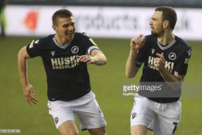 How has Scott Malone adjusted to life back at Millwall?