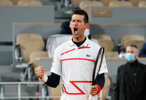 French Open: Novak Djokovic battles past Pablo Carreno Busta
