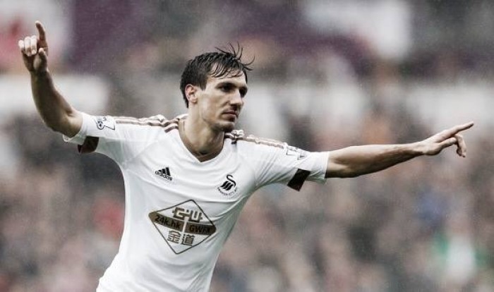 Swansea City 3-1 Liverpool: Ayew at the double as Swans secure safety in style
