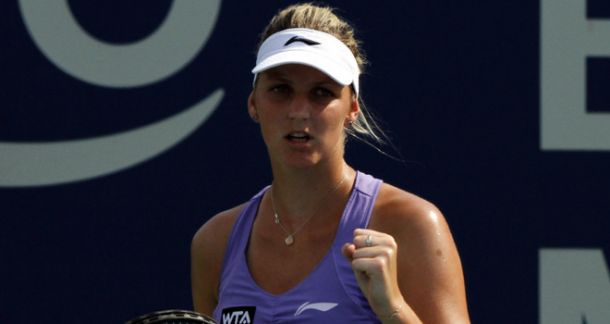 Kerber crashes out as Bouchard progresses