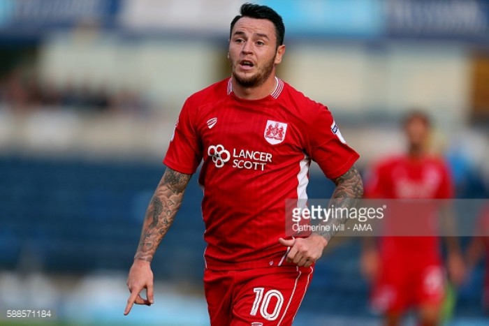 Cardiff City sign Bristol City midfielder Lee Tomlin on three-year deal