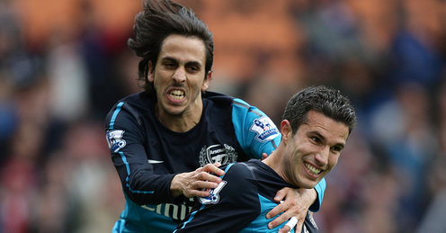 Arsenal held by dogged Stoke