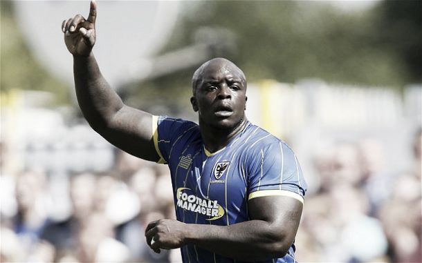 Akinfenwa signs new deal with AFC Wimbledon
