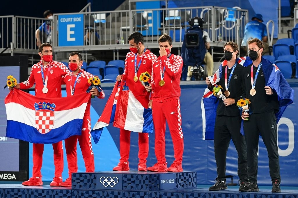 The men's doubles podium. Photo: Vincenzo Pinto