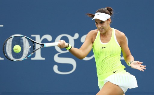 Ana Konjuh hits a forehand to Varvara Lepchenko during their third round match at the U.S. Open/Photo: Elsa/Getty Images