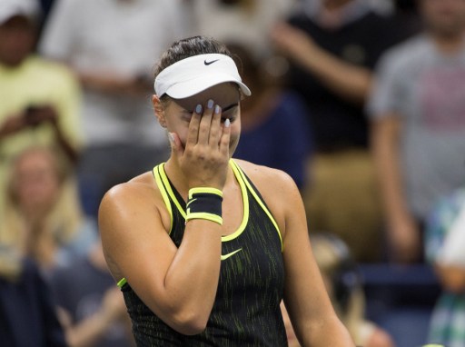 Ana Konjuh reacts after her fourth round victory over Agnieszka Radwanska at the U.S. Open/Photo: Don Emmert/AFP