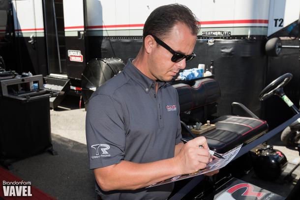 Steve Torrence signs some autographs for fans