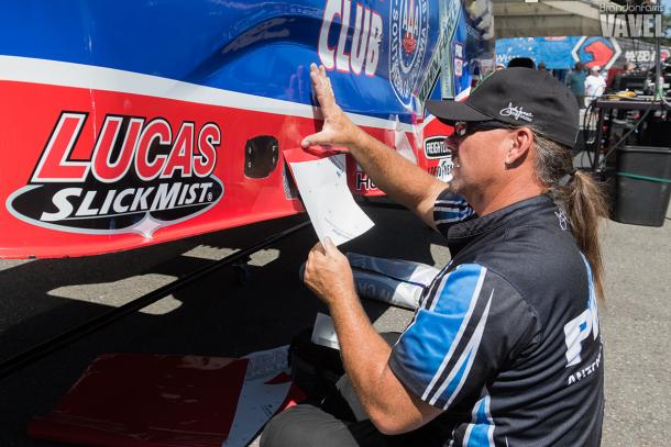 With the different exhaust pipes Funny Car runs, its a constant battle having to replace logos and melted paint on the car. 