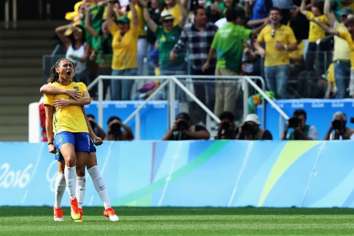 Beatriz celebrates cutting Brazil's deficit in half with a goal in the 79th minute against Canada. (Photo: Alexandre Schneider/Getty Images)