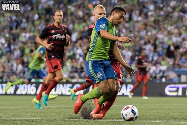Seattle Sounders midifled Cristian Roldan earns a penalty for the Sounders against the Portland Timbers | Source: Brandon Farris - VAVEL USA