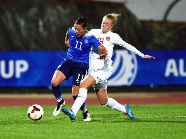 Ali Krieger and Norway's Marie Markussen battle for possession | Source: Brad Smith-ISI Photos