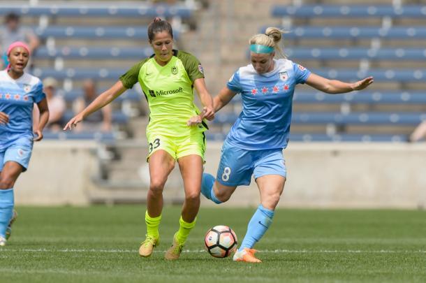 Katie Johnson of Seattle Reign (left) battles with Julie Ertz of the Chicago Red Stars. Source: The Bold