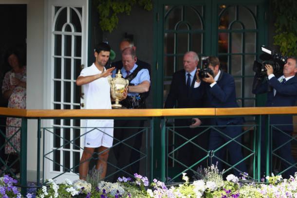 Novak Djokovic celebrates his fourth Wimbledon crown (Getty/Michael Steele)