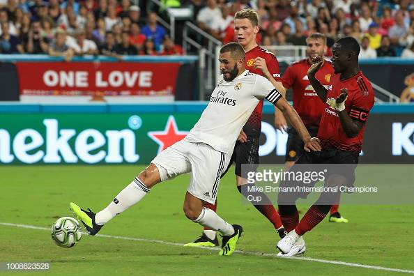 MIAMI, FL - JULY 31: Karim Benzema #9 of Real Madrid scores a goal against Manchester United in the first half of the International Champions Cup at Hard Rock Stadium on July 31, 2018 in Miami, Florida. (Photo by Mike Ehrmann/International Champions Cup/Getty Images)