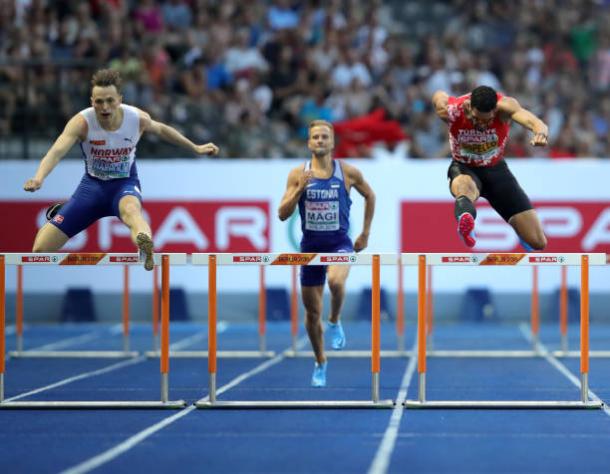 Warholm and Copello head over the final hurdle, with the Norwegian pushing on to take the title (Getty/Alexander Hassenstein)