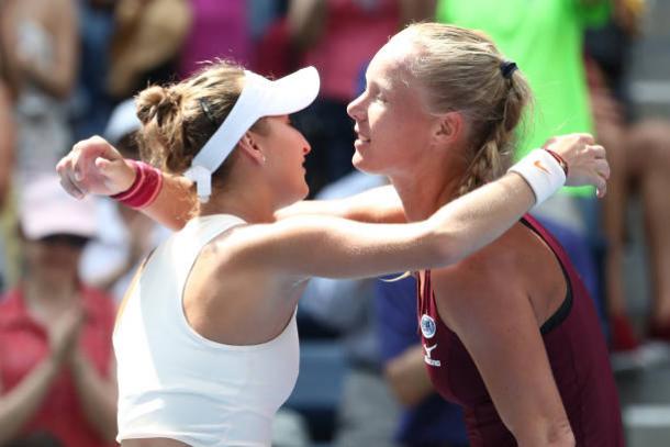 Vondrousova and Bertens embrace at the end of the match (Getty Images/Al Bello)