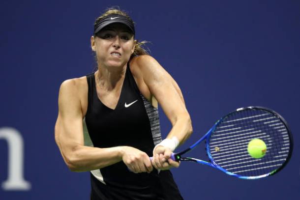 Maria Sharapova in action during her fourth-round loss against Suarez Navarro | Photo: Julian Finney/Getty Images North America