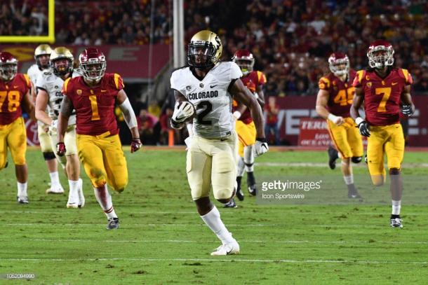 Shenault scores against USC at the Coliseum (image source: Brian Rothmuller/Icon Sportswire via Getty Images)