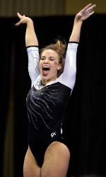 Mary Beth Box celebrates a big floor routine at the NCAA Women's Gymnastics Championships/Georgia Bulldogs