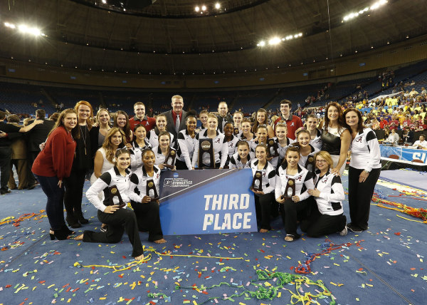 Alabama celebrates their third place finish at the NCAA Women's Gymnastics Championships/Alabama Athletics 