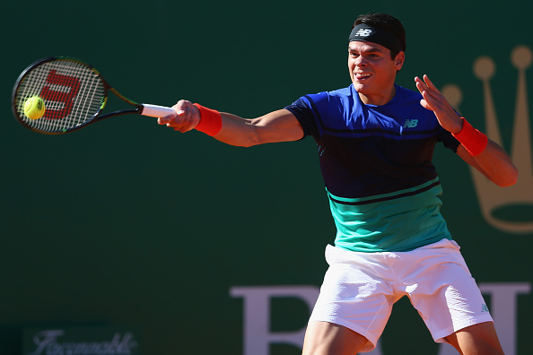 Milos Raonic hits a forehand return (Photo: Michael Steele/Getty Images)