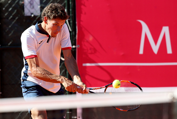 Pablo Carreno Busta in action during his doubles match at he Millenium Estoril Open (Photo: Gualter Fatia/Getty Images) 