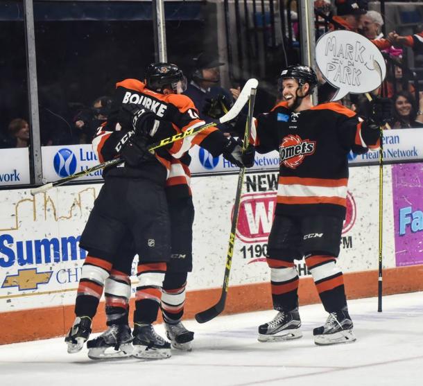 The Komets celebrate after a goal. Credit: Eye 2 Eye Portraits