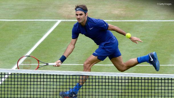 Federer hits a volley for a winner at the 2016 Mercedes Cup in Stuttgart. Credit: ATP World Tour/Getty Images
