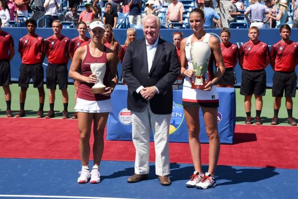 From left to right: Runner-up Angelique Kerber, President and CEO of Western & Southern Financial Group John Barrett and Pliskova during the trophy presentation ceremony. Photo credit: Western & Southern Open.
