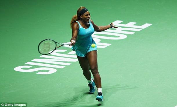 Serena Williams hits a forehand at the 2014 WTA Finals in Singapore/Getty Images