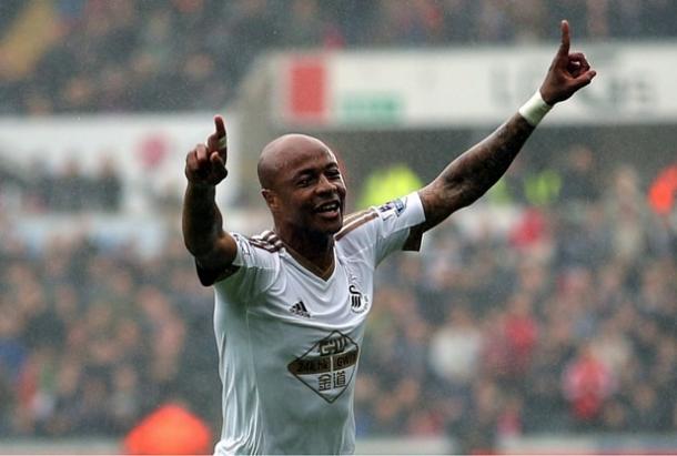Ayew celebrates scoring against Liverpool at the weekend. (Photo: South Wales Evening Post)