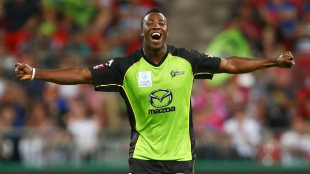 Andre Russell made his mark in the field to help the Thunder reach their first Big Bash final (image via: smh.com)