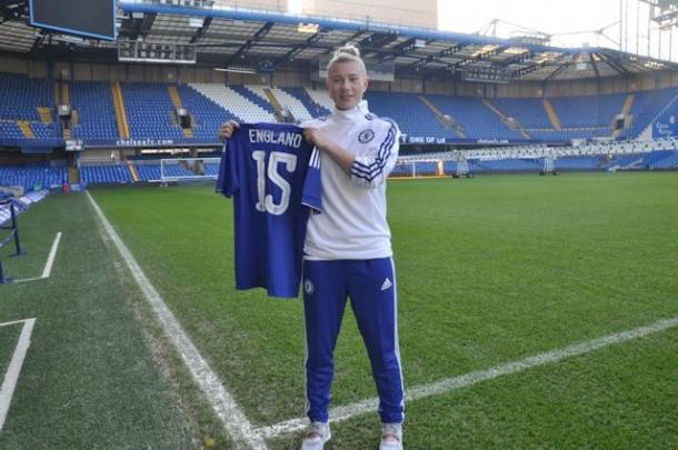 England poses with her new shirt and number. | Photo: Chelsea Ladies FC