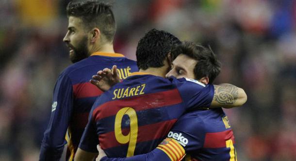 Messi celebrating with Suarez. Photo: MARCA