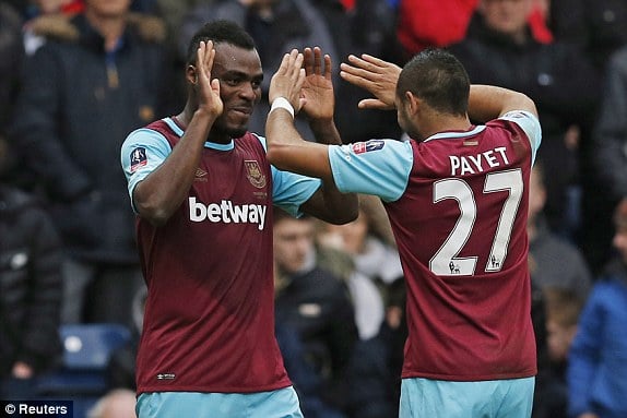 Emmanuel Emenike celebrates a dominant win over Blackburn with Dimitri Payet. (Photo: Reuters)