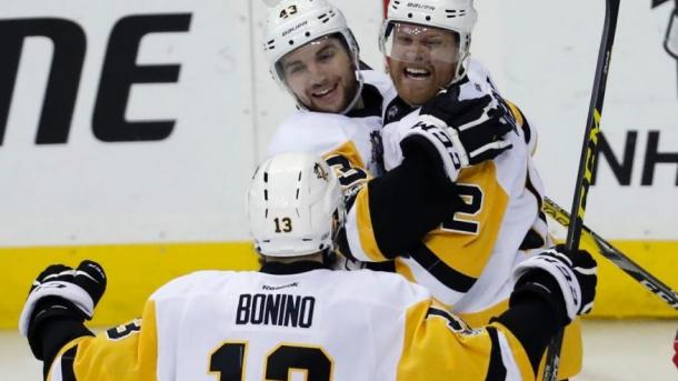 Hornqvist (celebrating with teammates Conor Sheary and Nick Bonino) put the game away with his third period goal/Photo: Alex Connor/Associated Press
