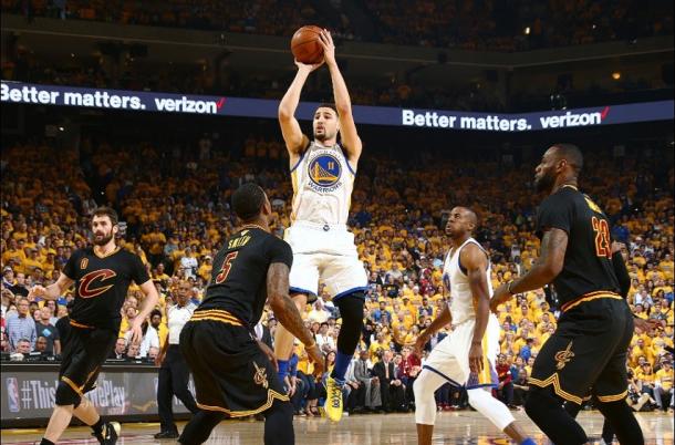 Golden State Warriors' guard Klay Thompson (13) shoots over Cleveland Cavaliers' guard J.R. Smith (5) in Game 5 of the NBA Finals on June 15, 2016. Photo: NBAE via Getty Images