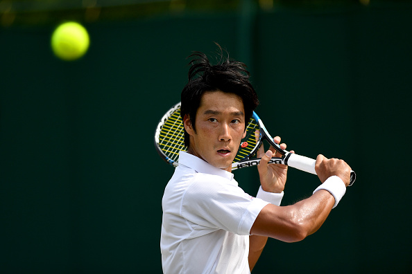 Yuichi Sugita prepares to hit a shot (Photo: David Ramos/Getty Images)