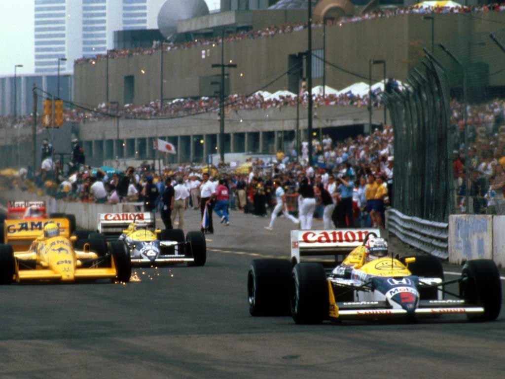 Nigel Mansell leads Ayrton Senna and Nelson Piquet at the 1987 Detroit Grand Prix ​​​​​​Photo Source: Imgur via Pinterest