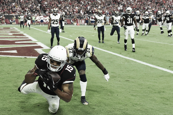 Wide receiver Michael Floyd of the Arizona Cardinals catches a 5 yard touchdown reception in front of cornerback Troy Hill of the Los Angeles Rams. (Oct. 1, 2016 - Source: Norm Hall/Getty Images North America)