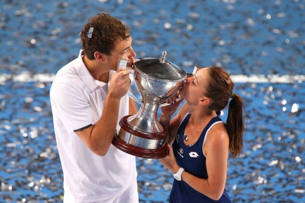 Jerzy Janowicz and Aga Radwanska celebrate following their win (Source: ABC) 