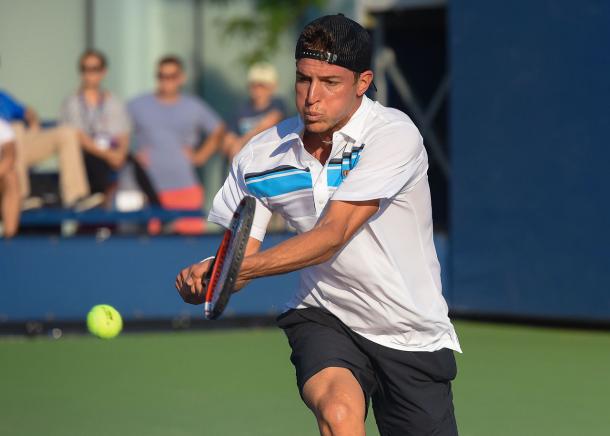 Jose Hernandez-Fernandez hits a backhand during his first-round qualifying match against Jonathan Eysseric at the 2015 U.S. Open. | Photo: Steven Pisano