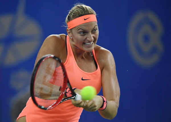 Petra Kvitova hits a backhand during her semifinal match against Simona Halep at the 2016 Dongfeng Motor Wuhan Open. | Photo: Greg Baker/AFP