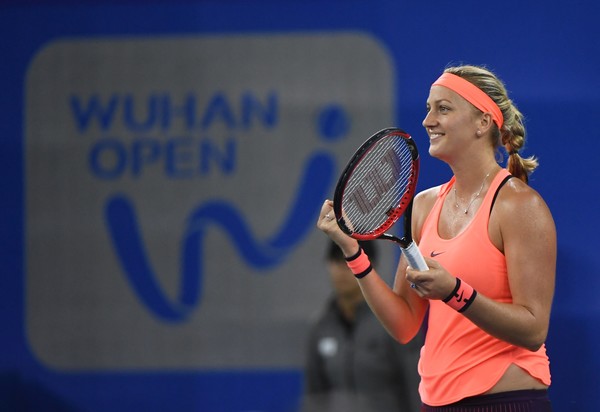 Petra Kvitova celebrates after defeating Simona Halep in the semifinals of the 2016 Dongfeng Motor Wuhan Open. | Photo: Greg Baker/AFP