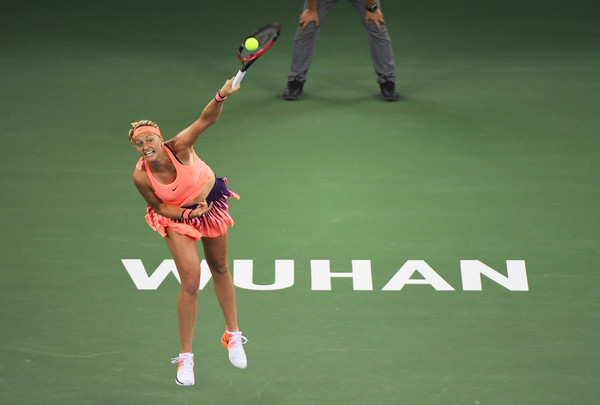 Petra Kvitova hits a serve against Dominika Cibulkova during the final of the 2016 Dongfeng Motor Wuhan Open. | Photo: Greg Baker/AFP