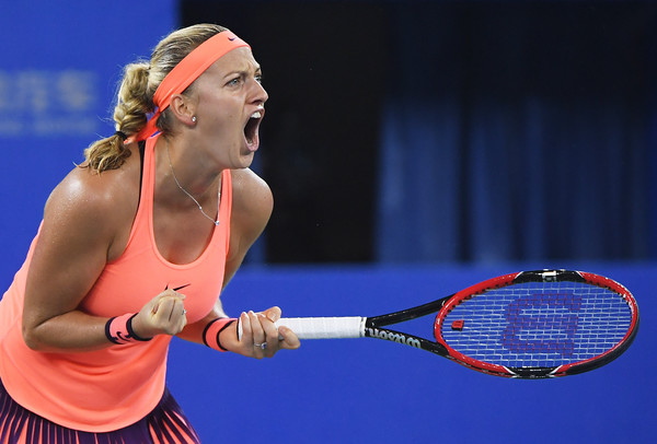 Petra Kvitova celebrates after winning a point against Dominika Cibulkova during the final of the 2016 Dongfeng Motor Wuhan Open. | Photo: Greg Baker/AFP