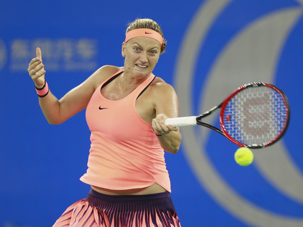 Petra Kvitova hits a forehand against Dominika Cibulkova during the final of the 2016 Dongfeng Motor Wuhan Open. | Photo: Kevin Lee/Getty Images