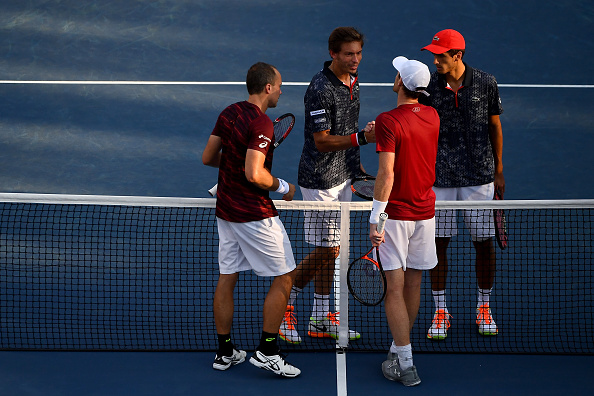 Jamie Murray and Bruno Soares shake hands with Pierre-Hugues Herbert and Nicolas Mahut after advancing to the final (Photo: Alex Goodlett/Getty Images)