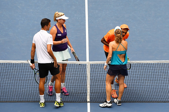 Laura Siegemund and Mate Pavic shake hands with Coco Vandeweghe and Rajeev Ram following the mixed doubles final (Photo: Alex Goodlett/Getty Images)
