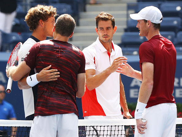 Jamie Murray and Bruno Soares shake hands with Pablo Carreno Busta and Guillermo Garcia-Lopez after the men's doubles final (Photo: Al Bello/Getty Images)